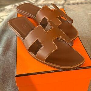 Hermes Oran Sandals Gold